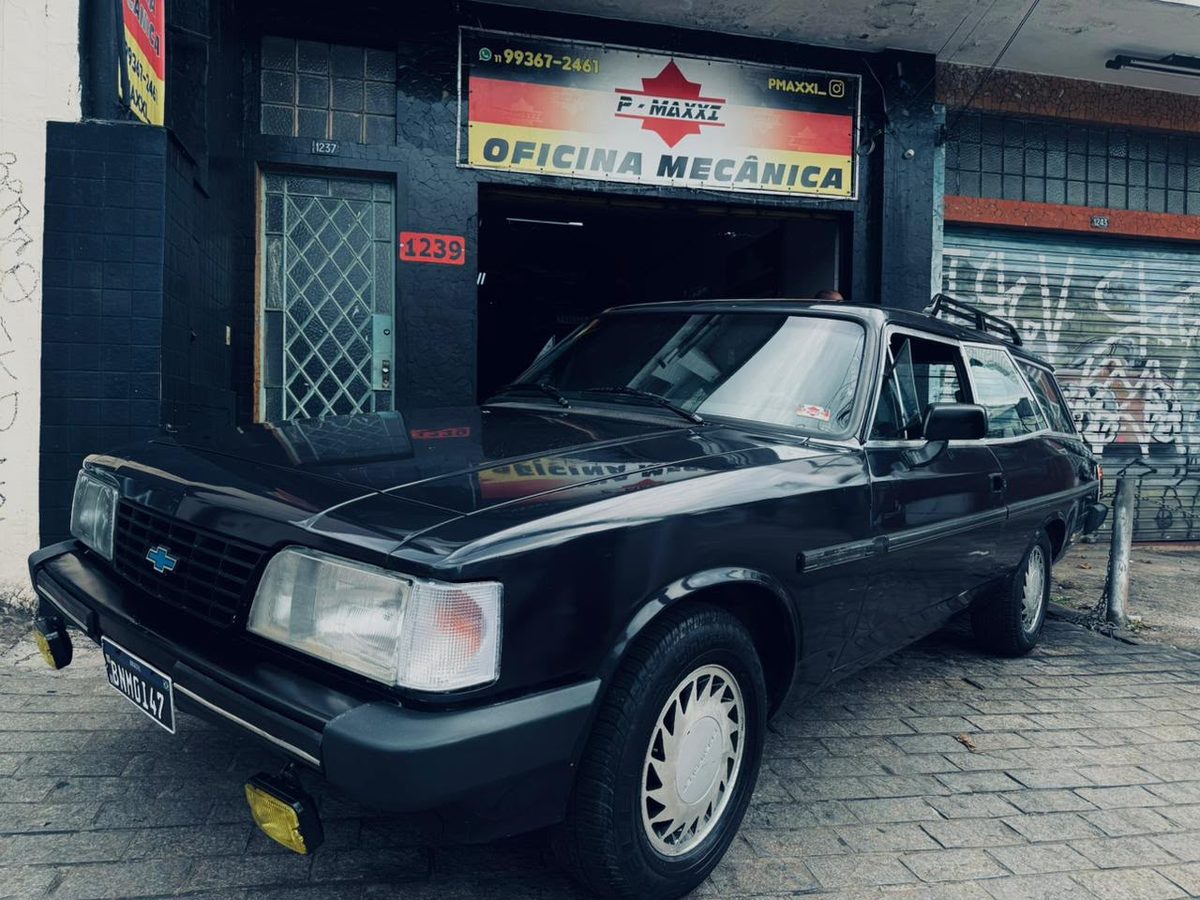 Fachada da Oficina Mecânica PMAXXI na Av. Casa Verde, 1239, Casa Verde, São Paulo, com a placa da P-MAXXI